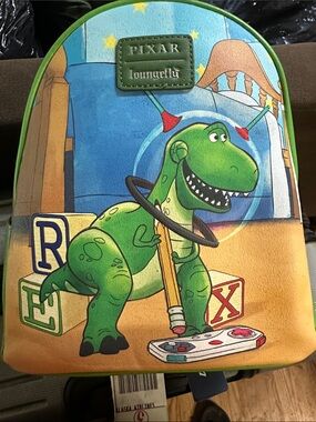 Loungefly Green and White Mini Backpack with Pixar Tag